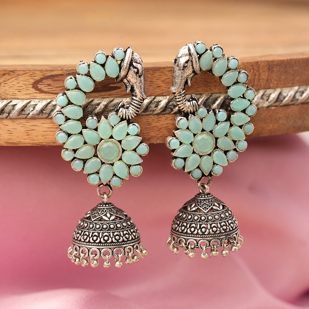 Tusks and twinkle stone studded jhumka earrings (Mint)