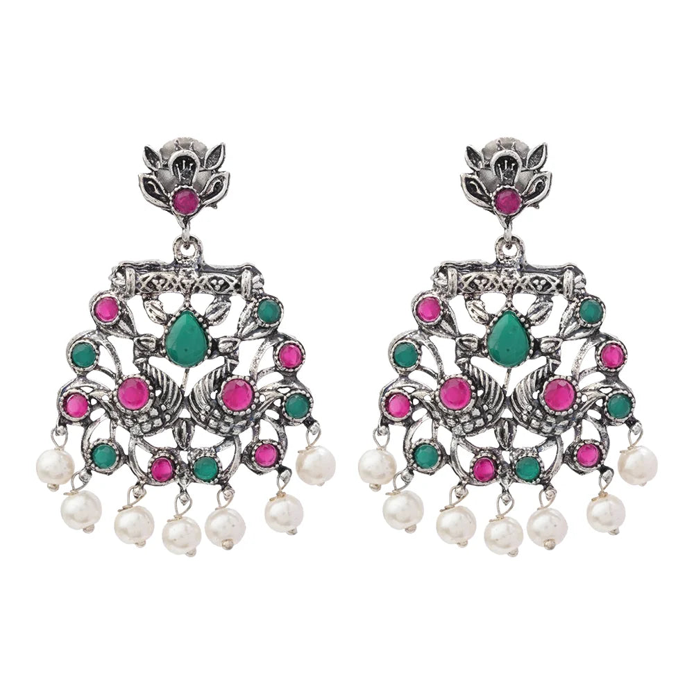 Peacock glow stone studded dangler earrings (White) Peacock glow stone studded dangler earrings (Multicolored) Combo set