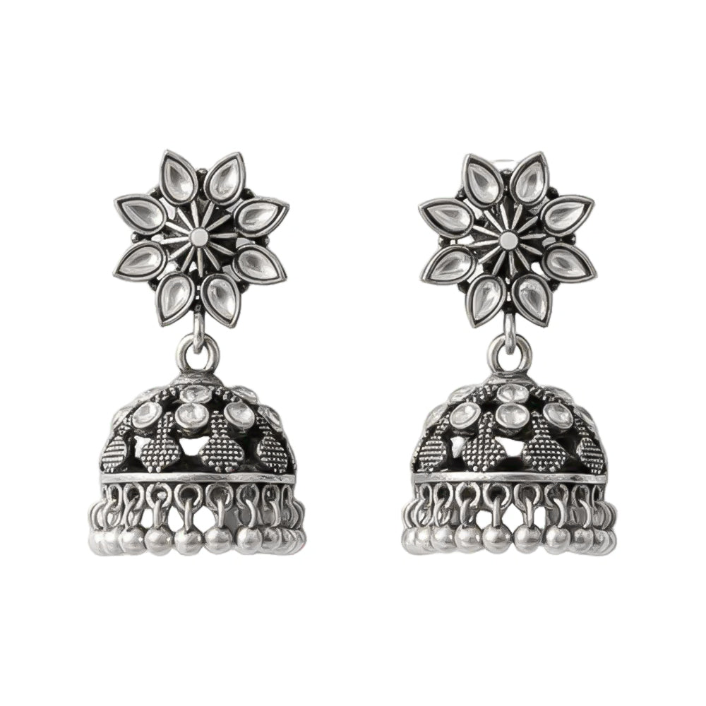 flower-shaped top with petal-like white stones