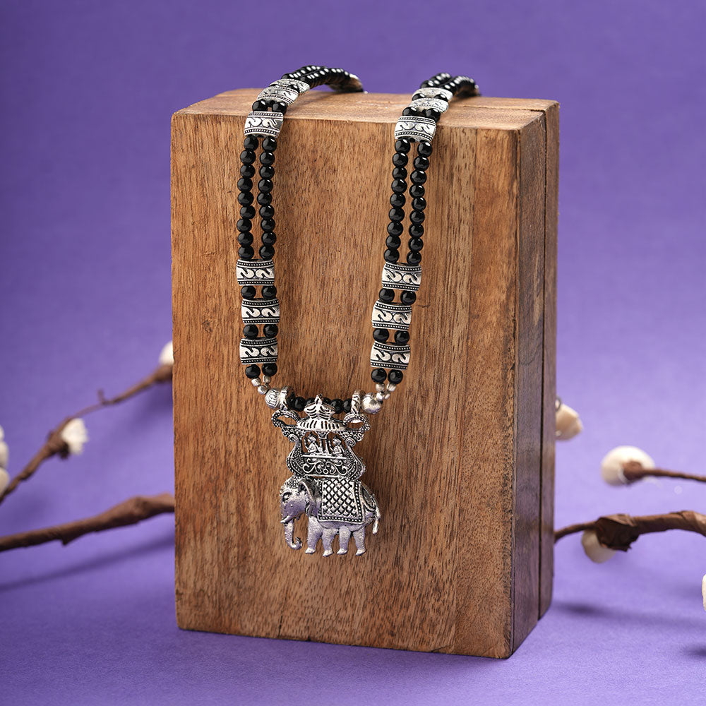 Tusker Tale statement pendant beaded neckpiece (Black)