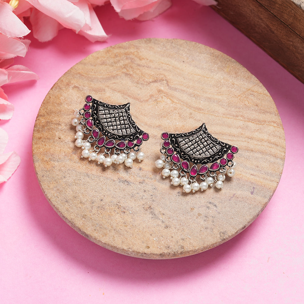 Red Stone Studded Lotus Petal Shaped Oxidised Earrings With Hanging Line Of Pearl