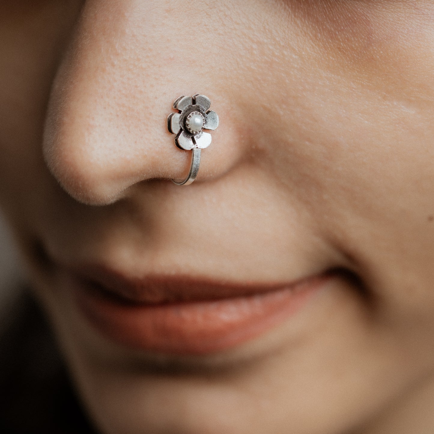 Golden petal stone studded nosepin (White)