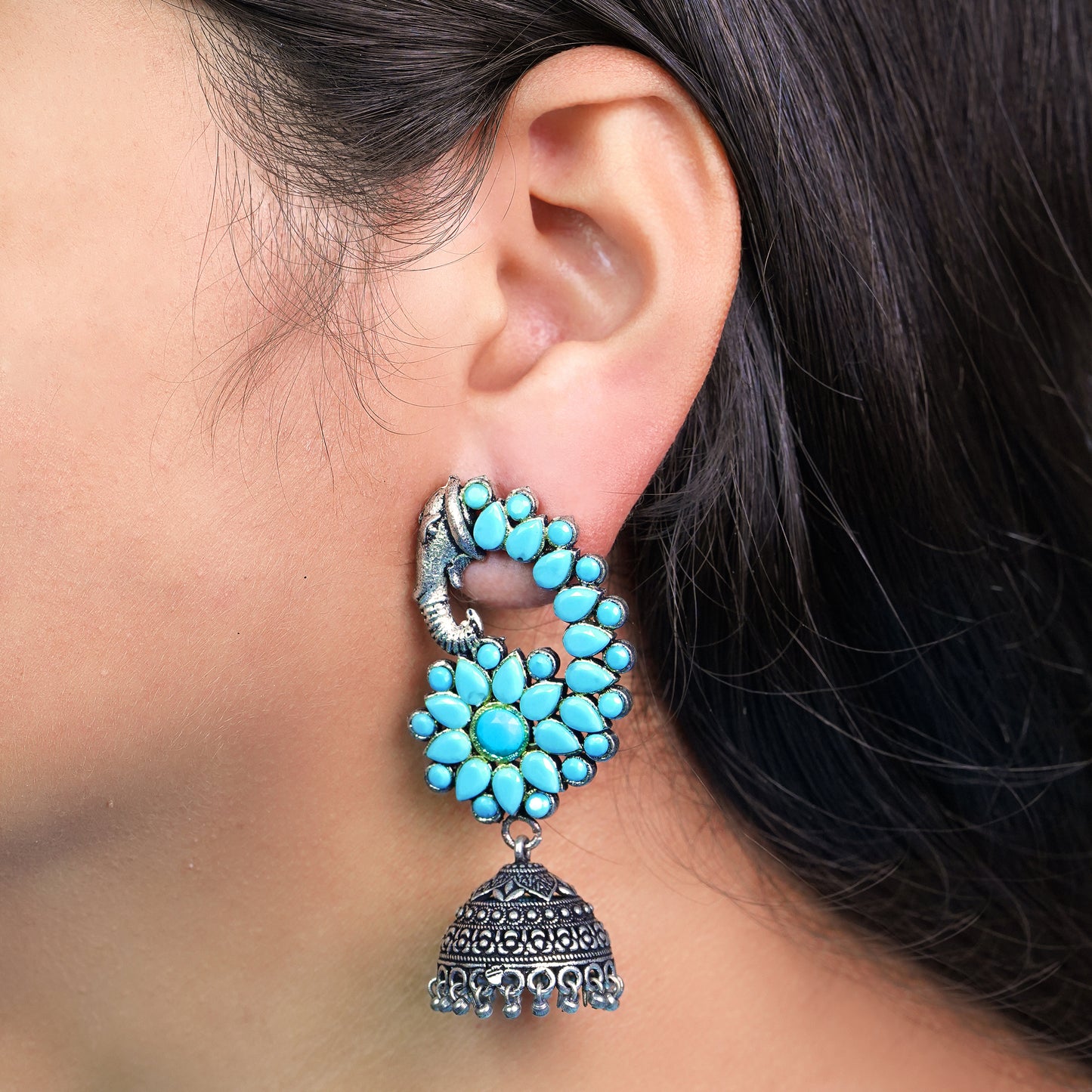 Sky Blue Stone Studded Peacock German Silver Earrings