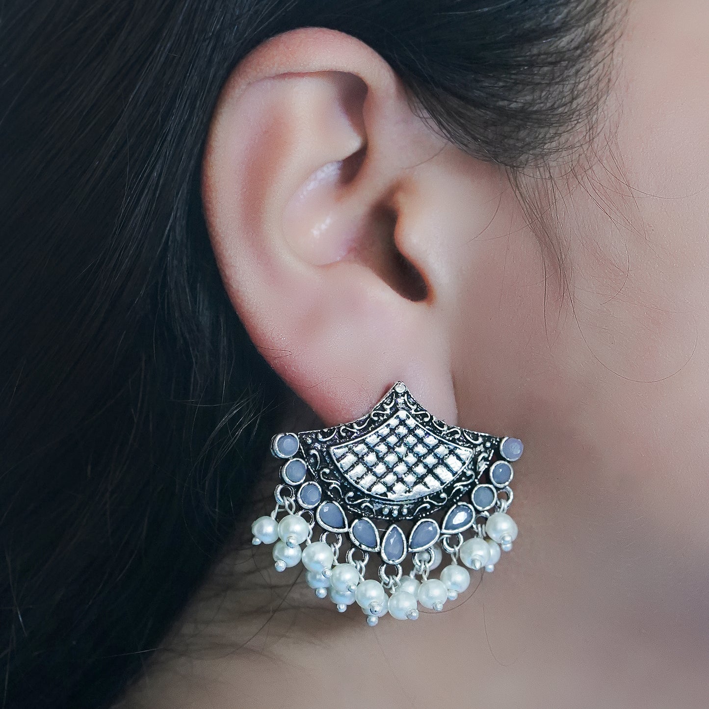 Gray Stone Studded Lotus Petal Shaped Oxidised Earrings With Hanging Line Of Pearl