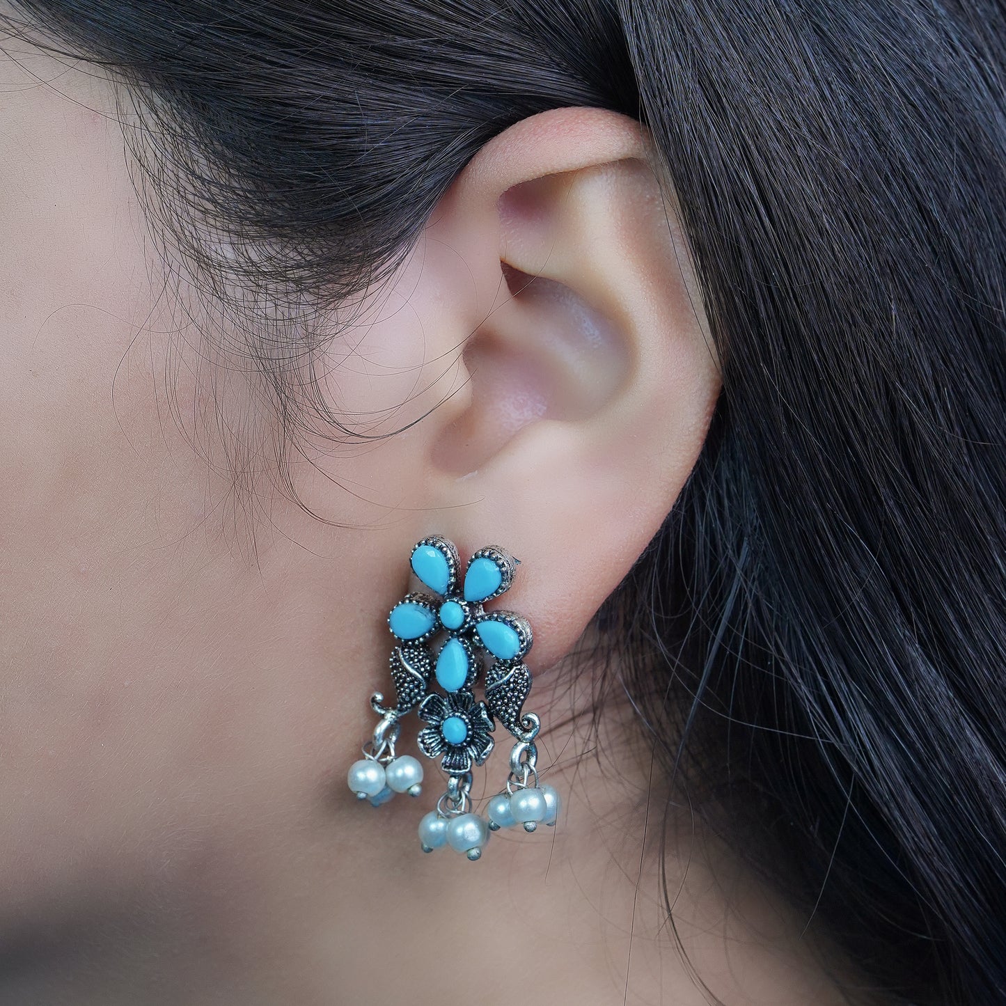 Sky Blue Stone Studded Oxidised Earrings With Hanging Pearl