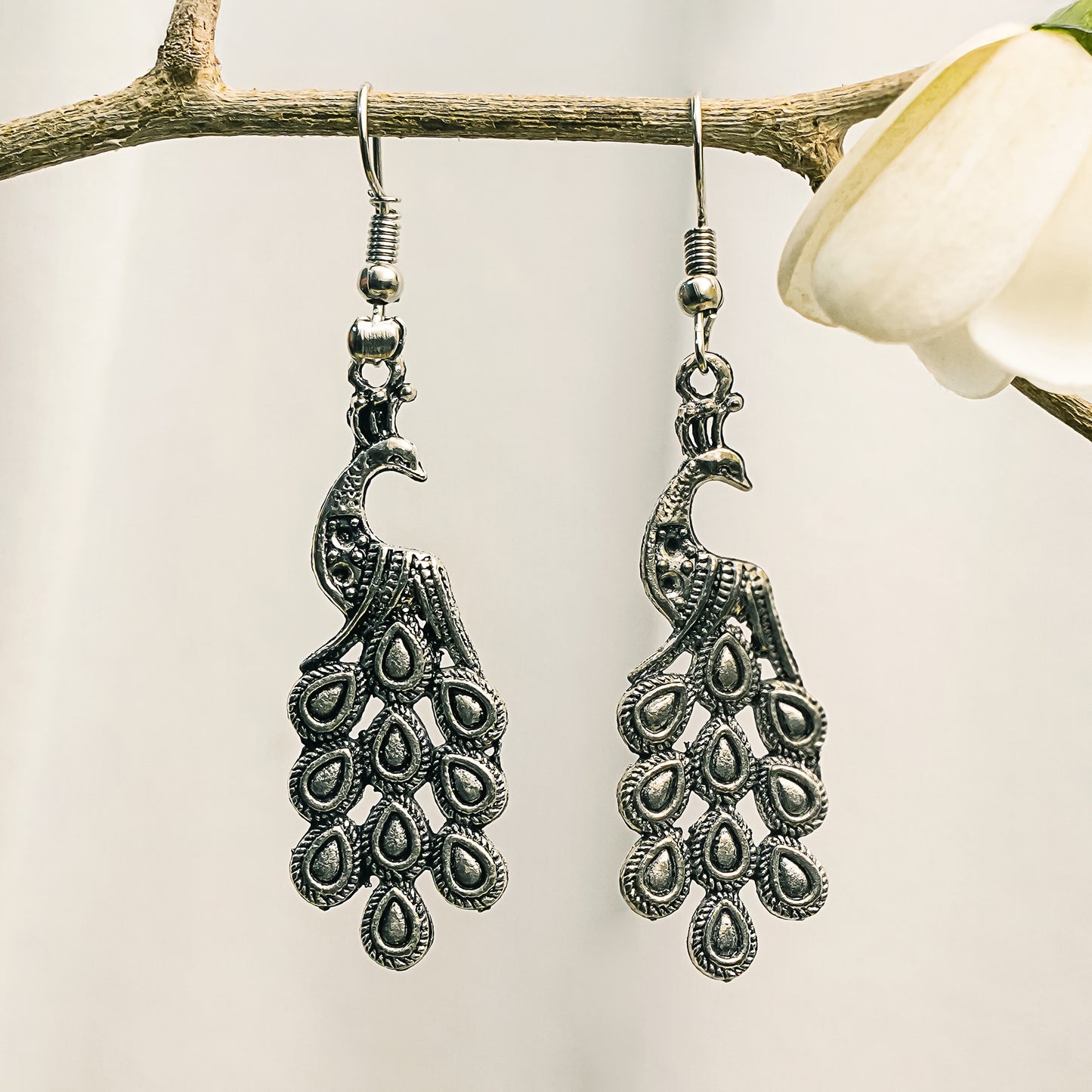 Magic mayur oxidized dangler earrings (Silver)