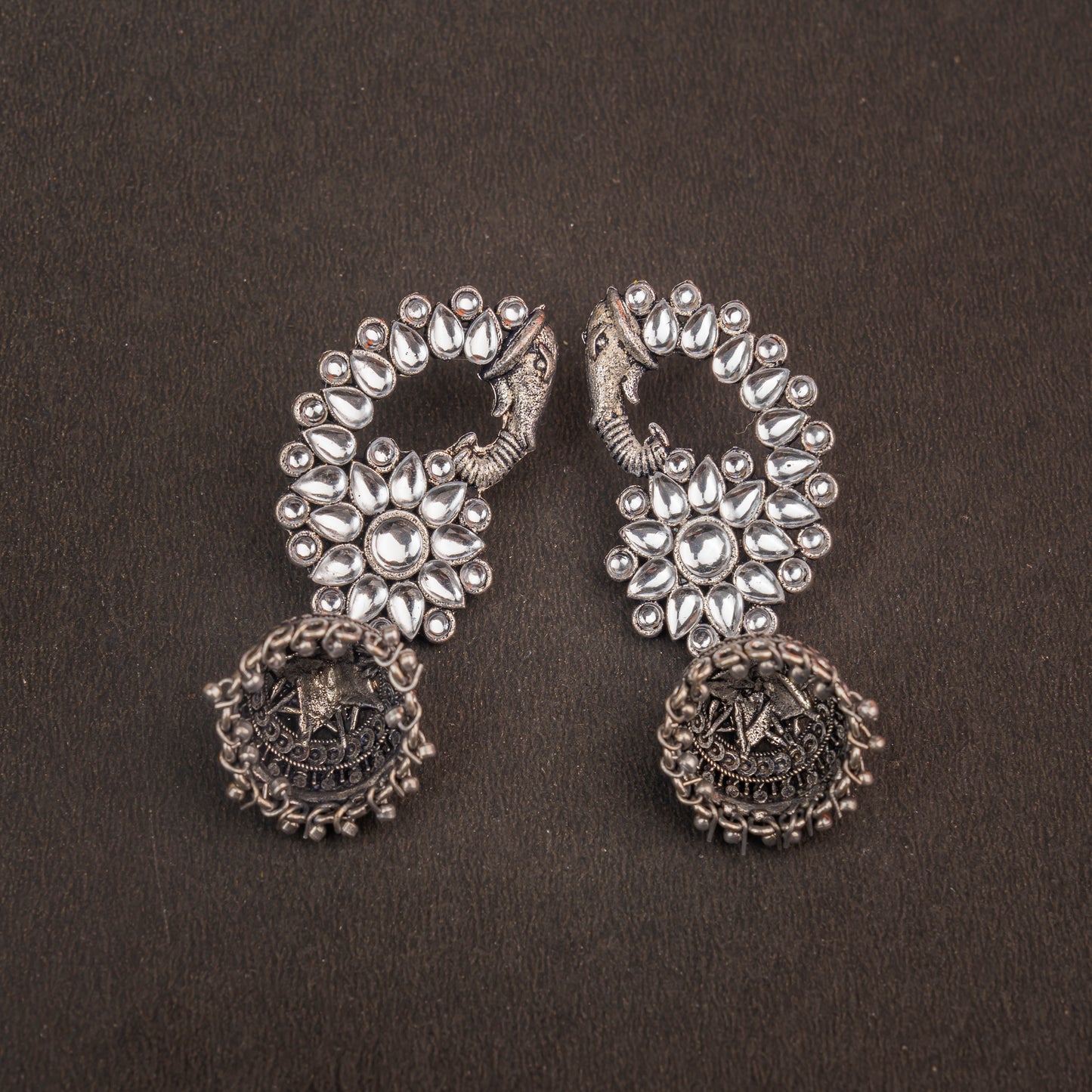 Tusks and twinkle stone studded jhumka earrings (White)