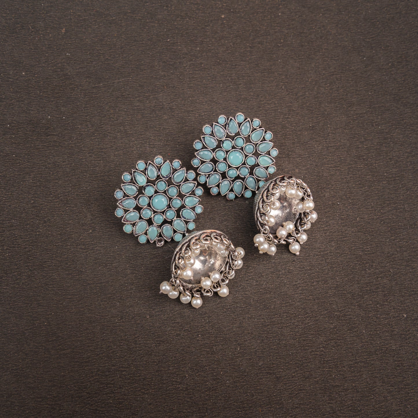 Floral carves stone studded jhumki earrings (Mint)