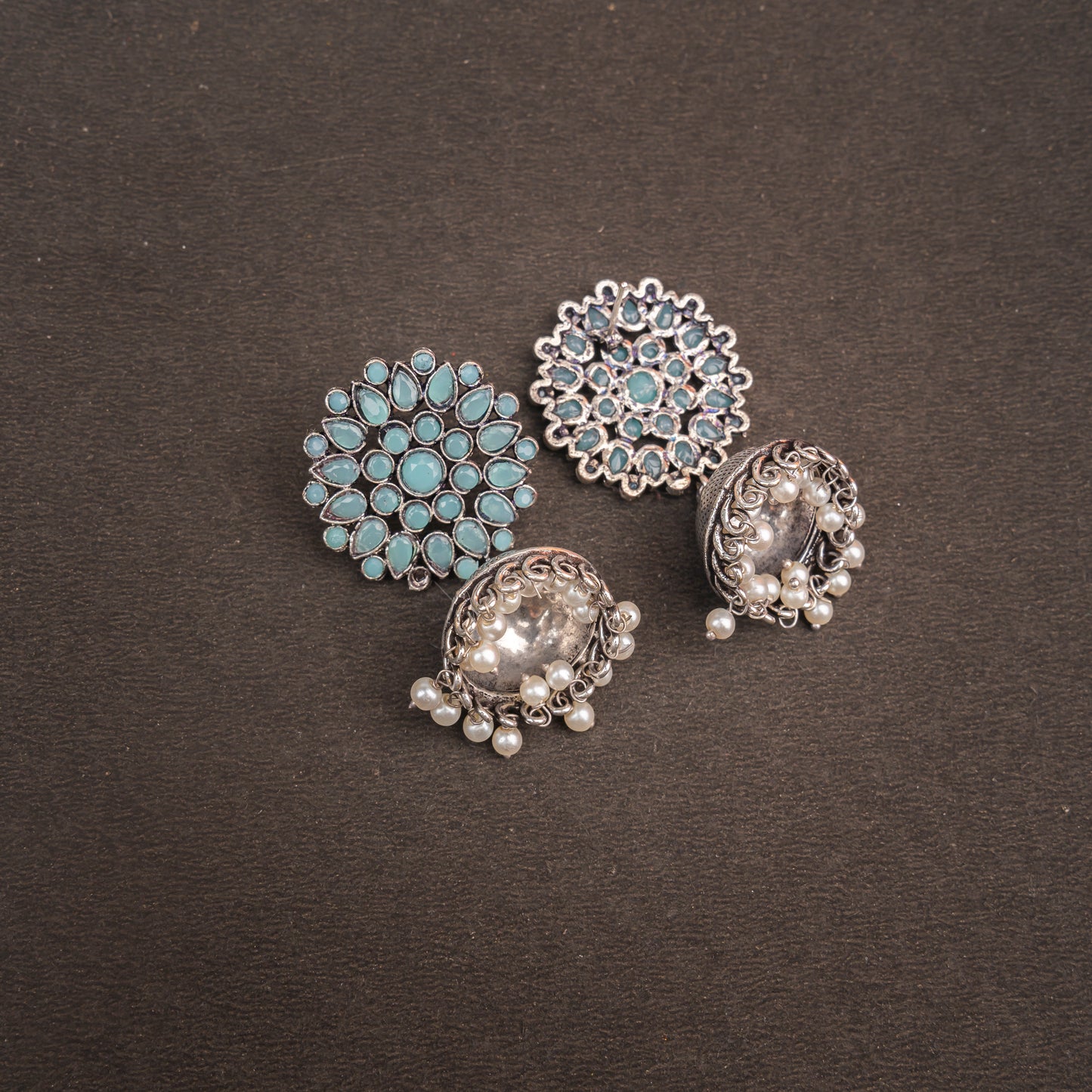 Floral carves stone studded jhumki earrings (Mint)
