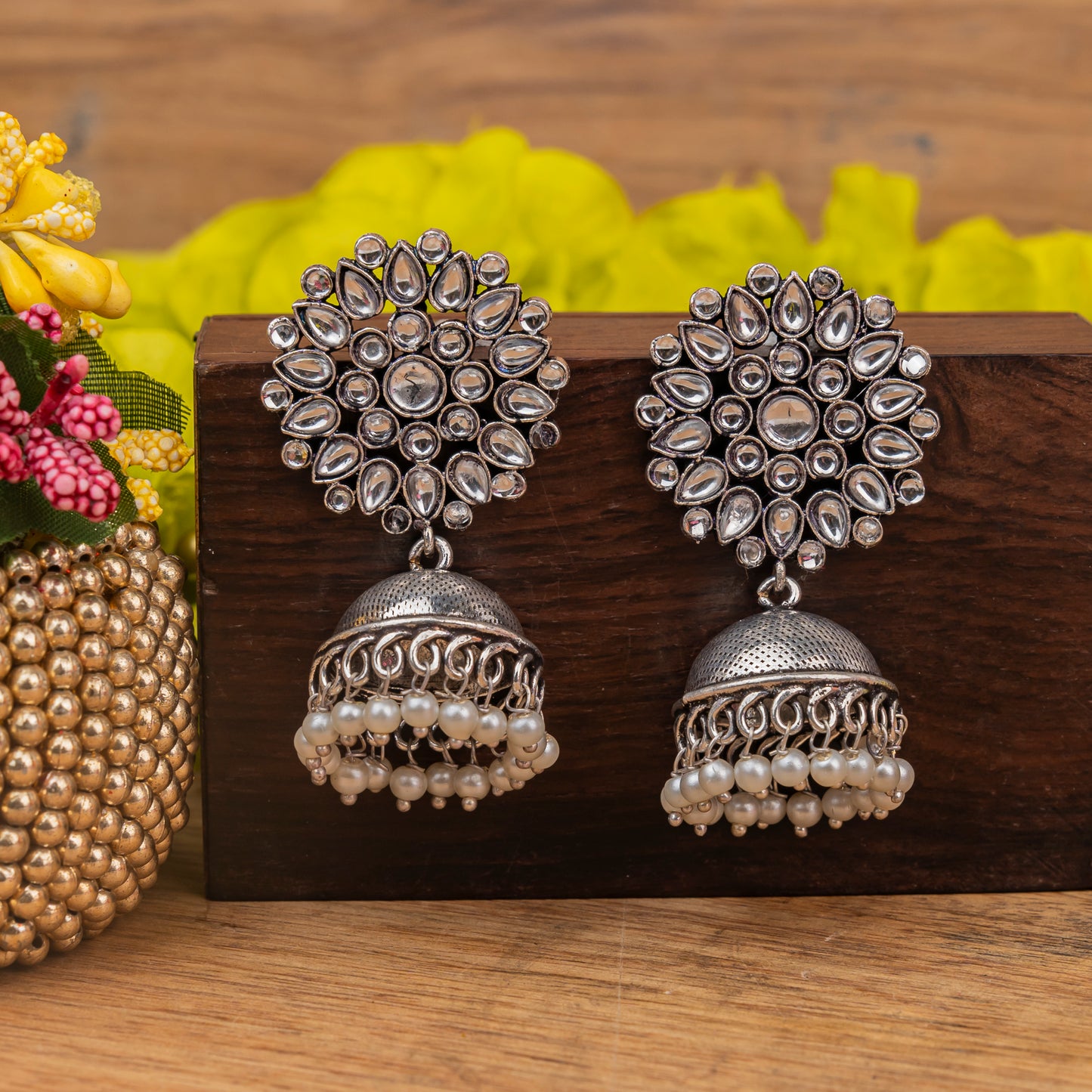 Floral carves stone studded jhumki earrings (White)