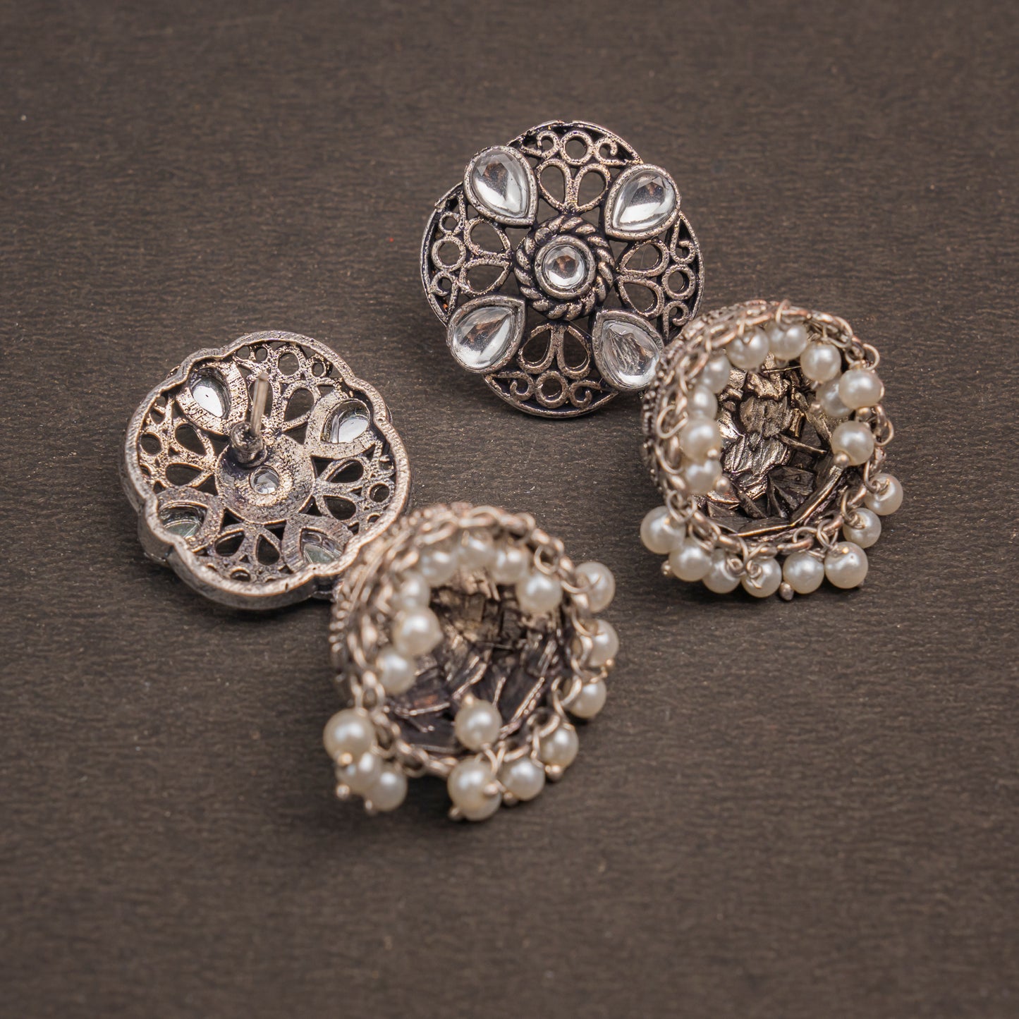 White Stone Studded Statement Earrings With Hanging Jhumka Embellished With Baby Pearls