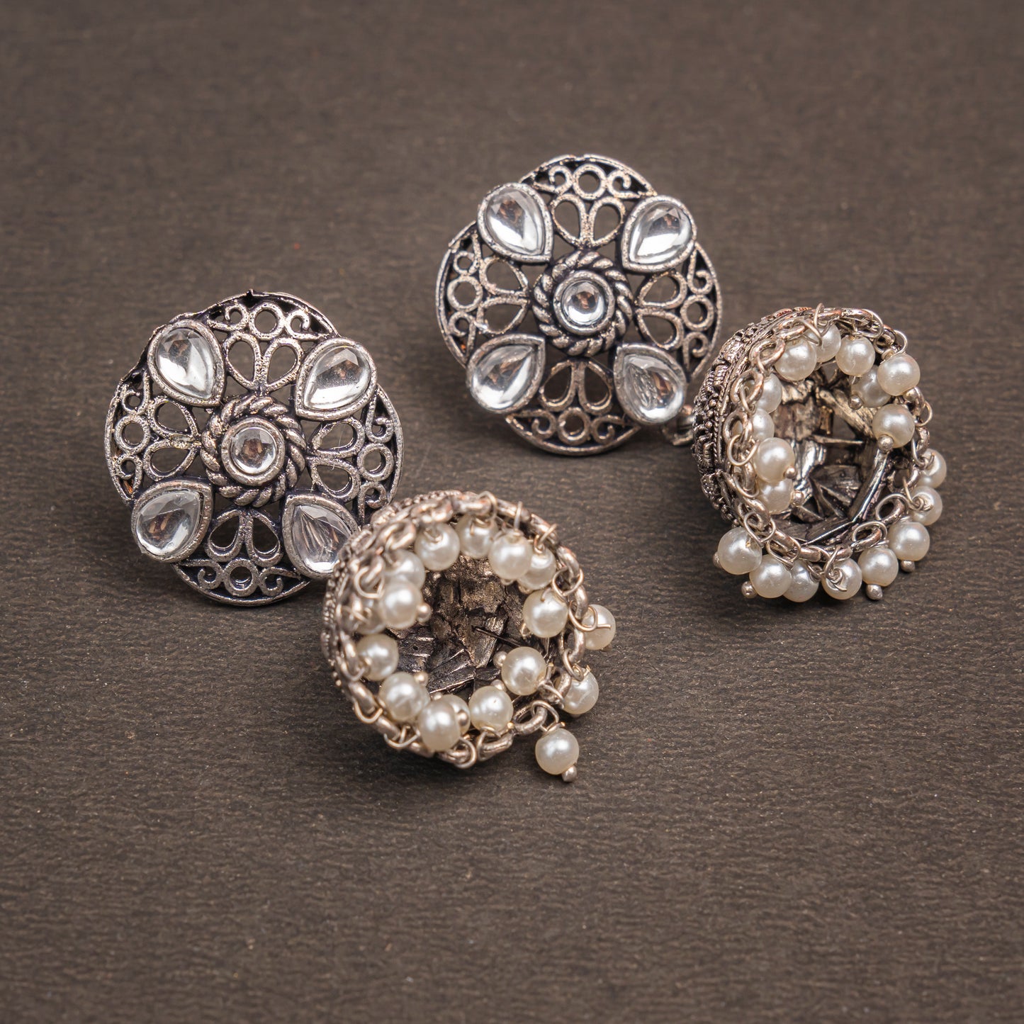 White Stone Studded Statement Earrings With Hanging Jhumka Embellished With Baby Pearls