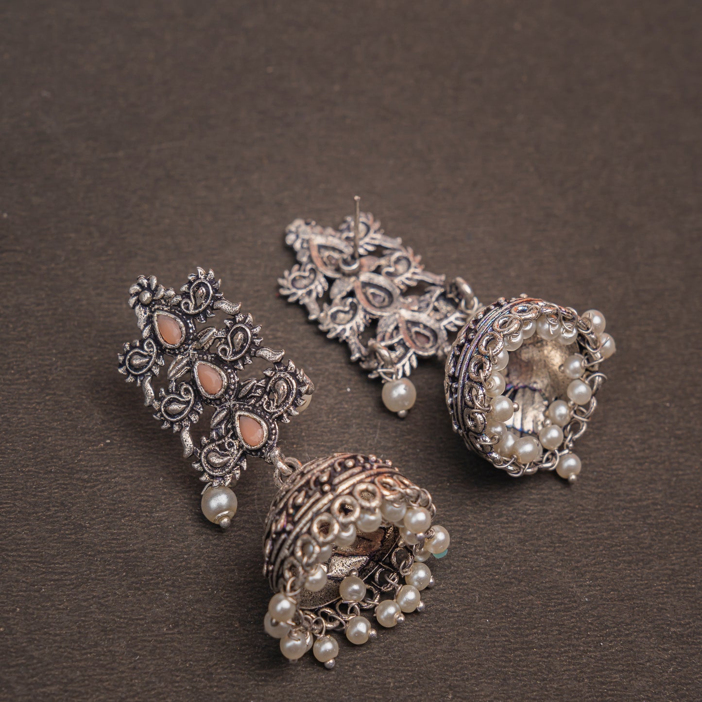 Light Orangish Stone Studded Statement German Silver Danglers With Brass Jhumki