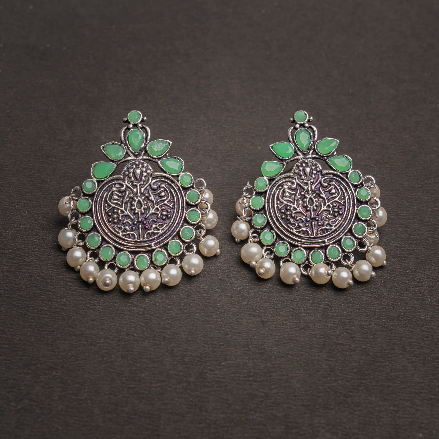 Pista Stone Studded German Silver Statement Earrings