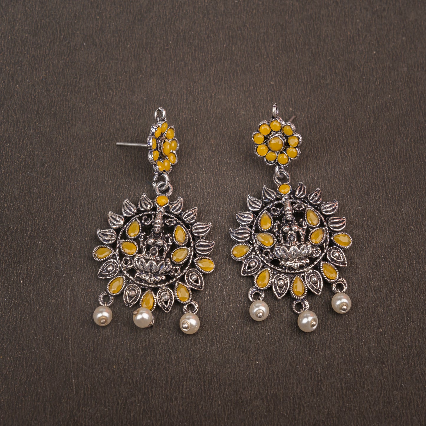 Yellow Stone Studded Laxmi Motif Oxidised Earrings With Hanging Pearls