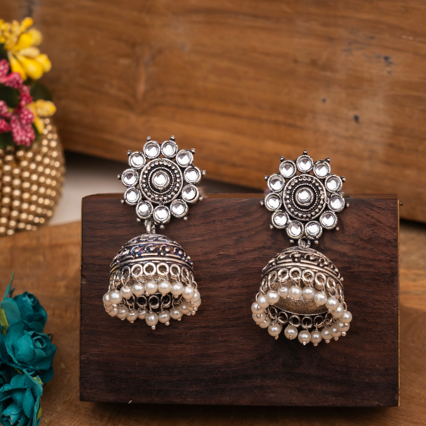 White Stone Studded German Silver Jhumki Earrings With Hanging Pearls