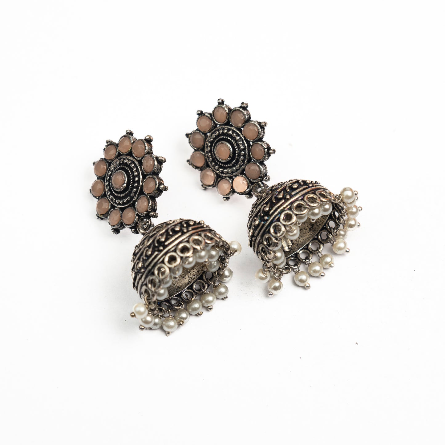 Light Orangish Stone Studded German Silver Jhumki Earrings With Hanging Pearls