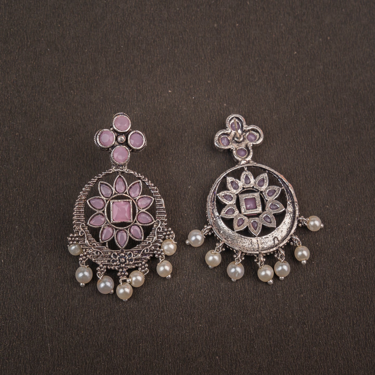 Baby Pink Stone Studded German Silver Stud Earrings With Hanging Pearls