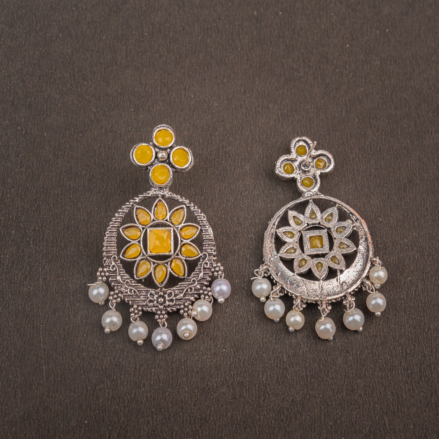 Yellow Stone Studded German Silver Stud Earrings With Hanging Pearls
