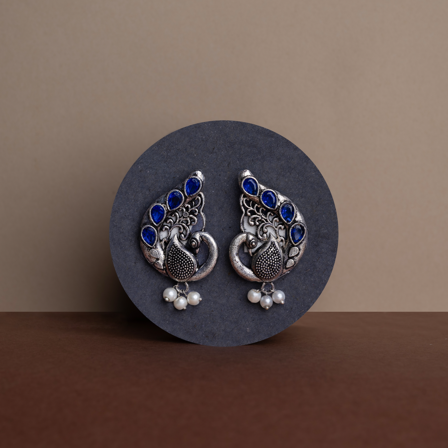 Ferocious Feathers stud earrings (Blue)