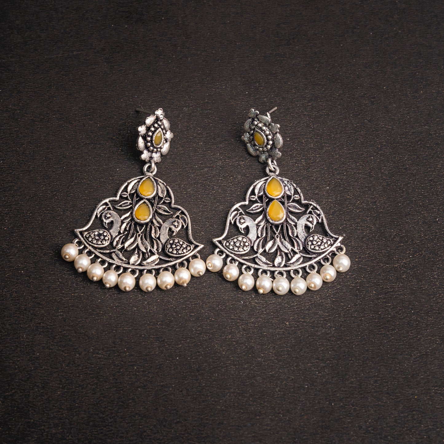 Yellow Stone Studded Oxidised Earrings With Hanging Jhumka