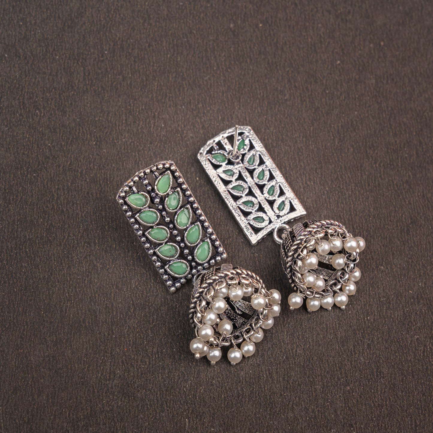 Regal leaffall stone studded jhumki earrings (Pista)