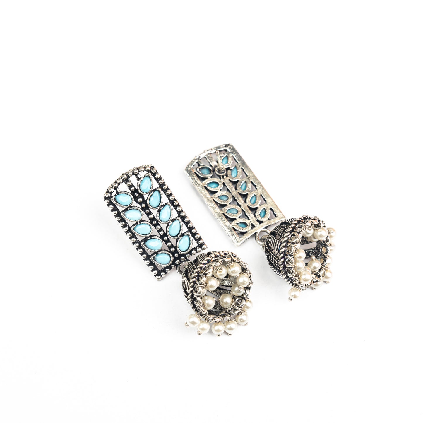 Sky Blue Stone Studded German Silver Statement Earrings With Brass Jhumki