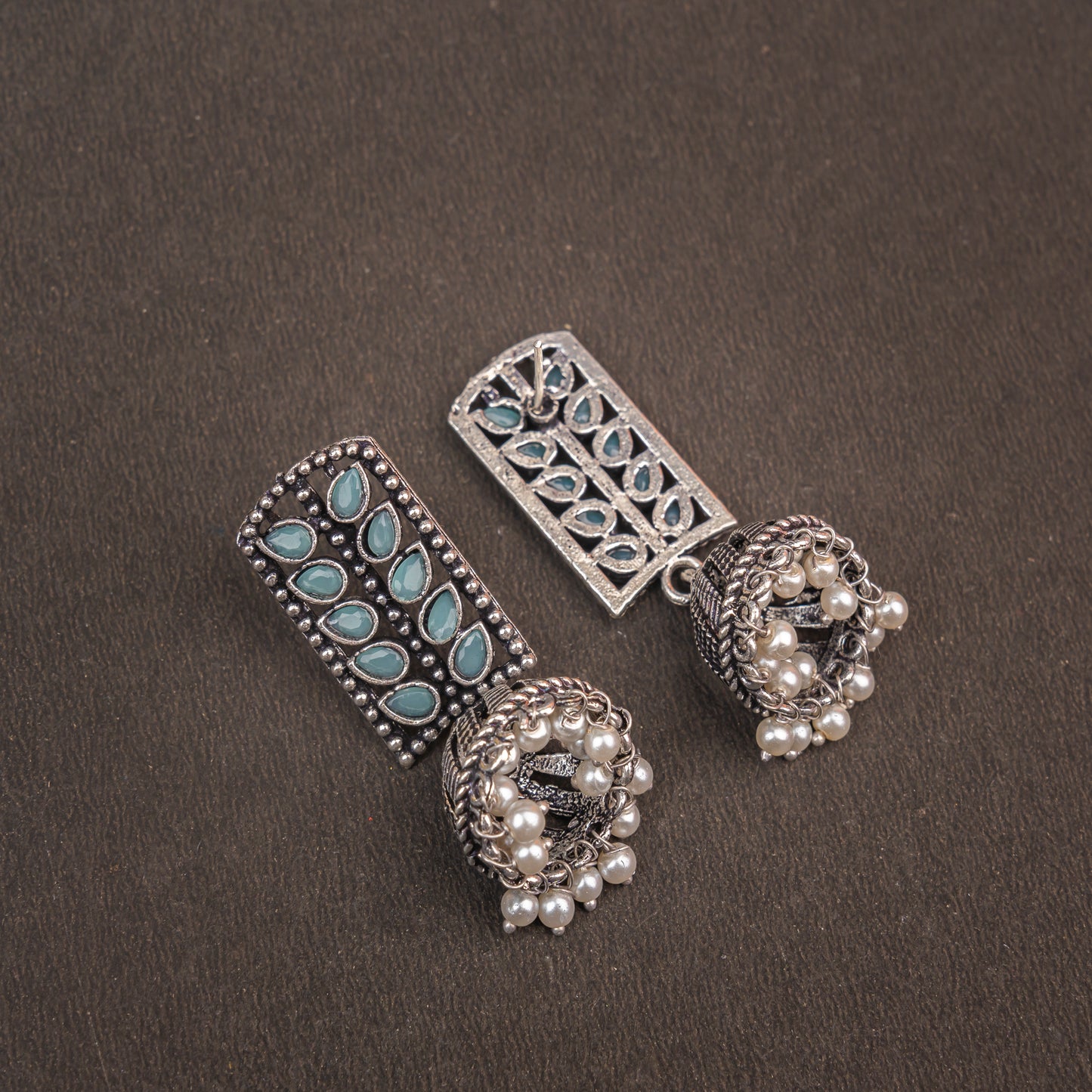 Mint Stone Studded German Silver Statement Earrings With Brass Jhumki