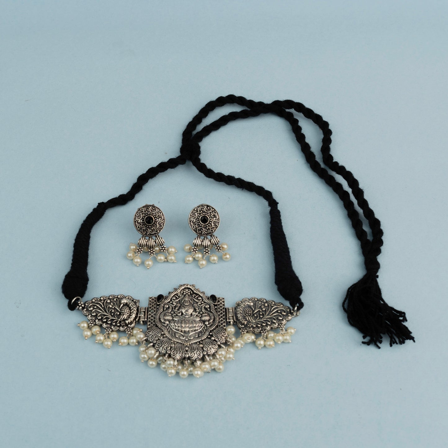 Black Stone studded Laxmi Motif German Silver Neckpiece set