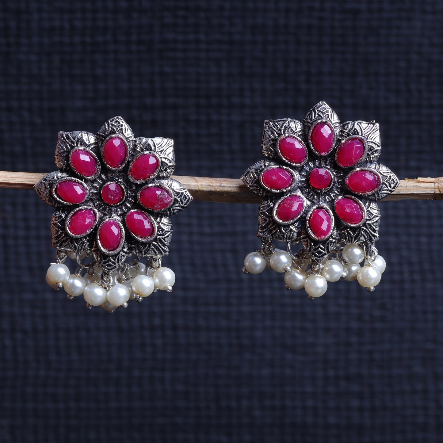 Red Stone Studded Oxidised Earrings With Hanging Pearls
