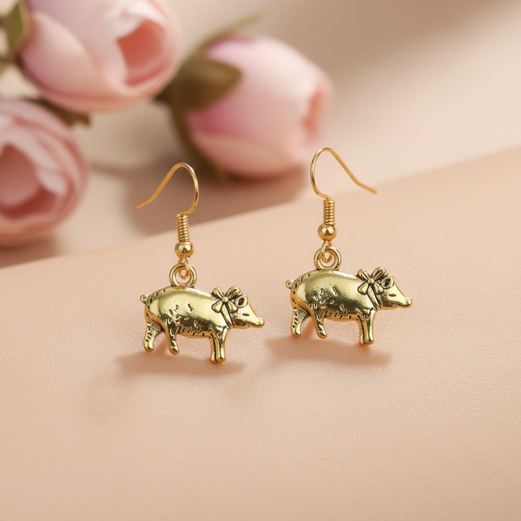 piggy dangler earrings