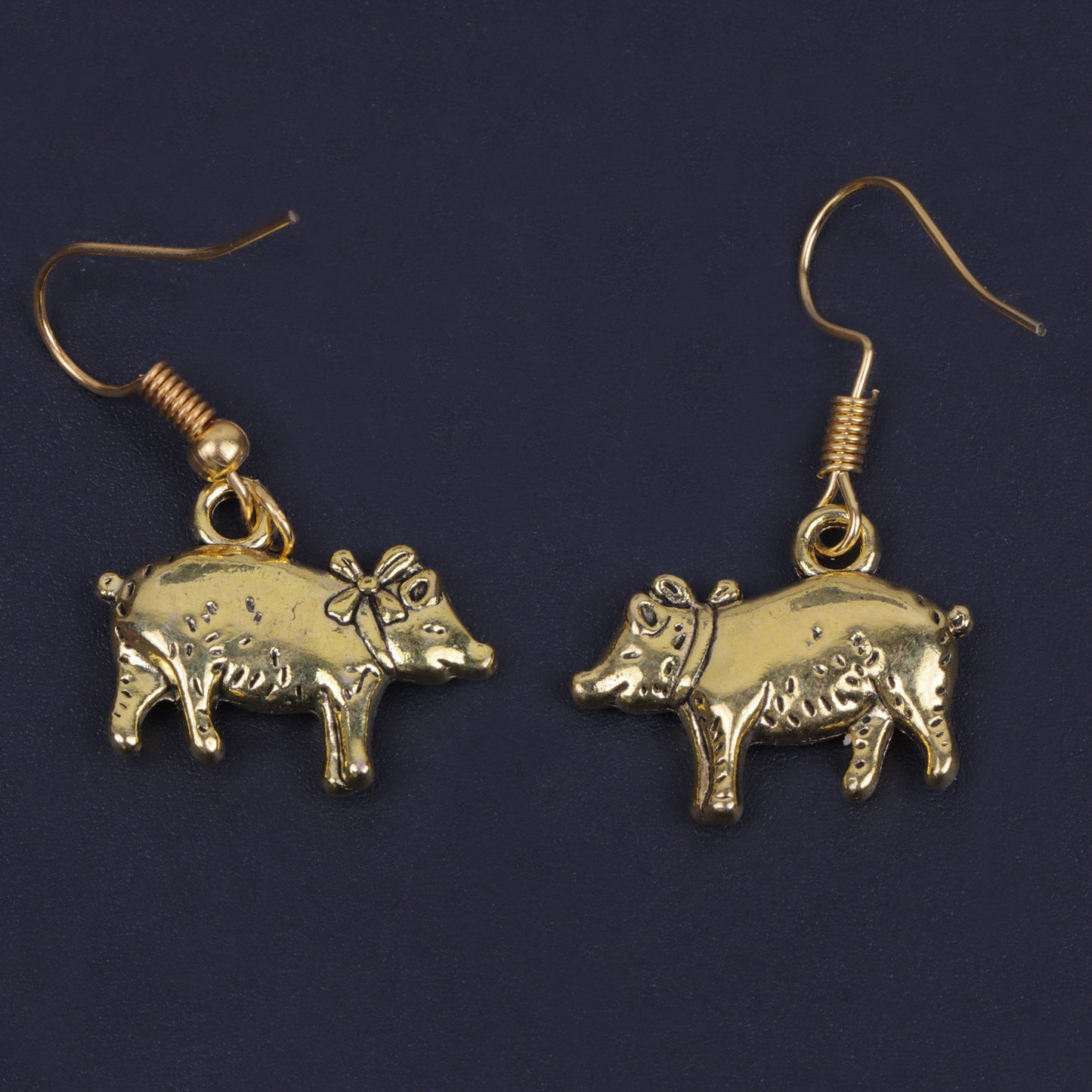 piggy dangler earrings