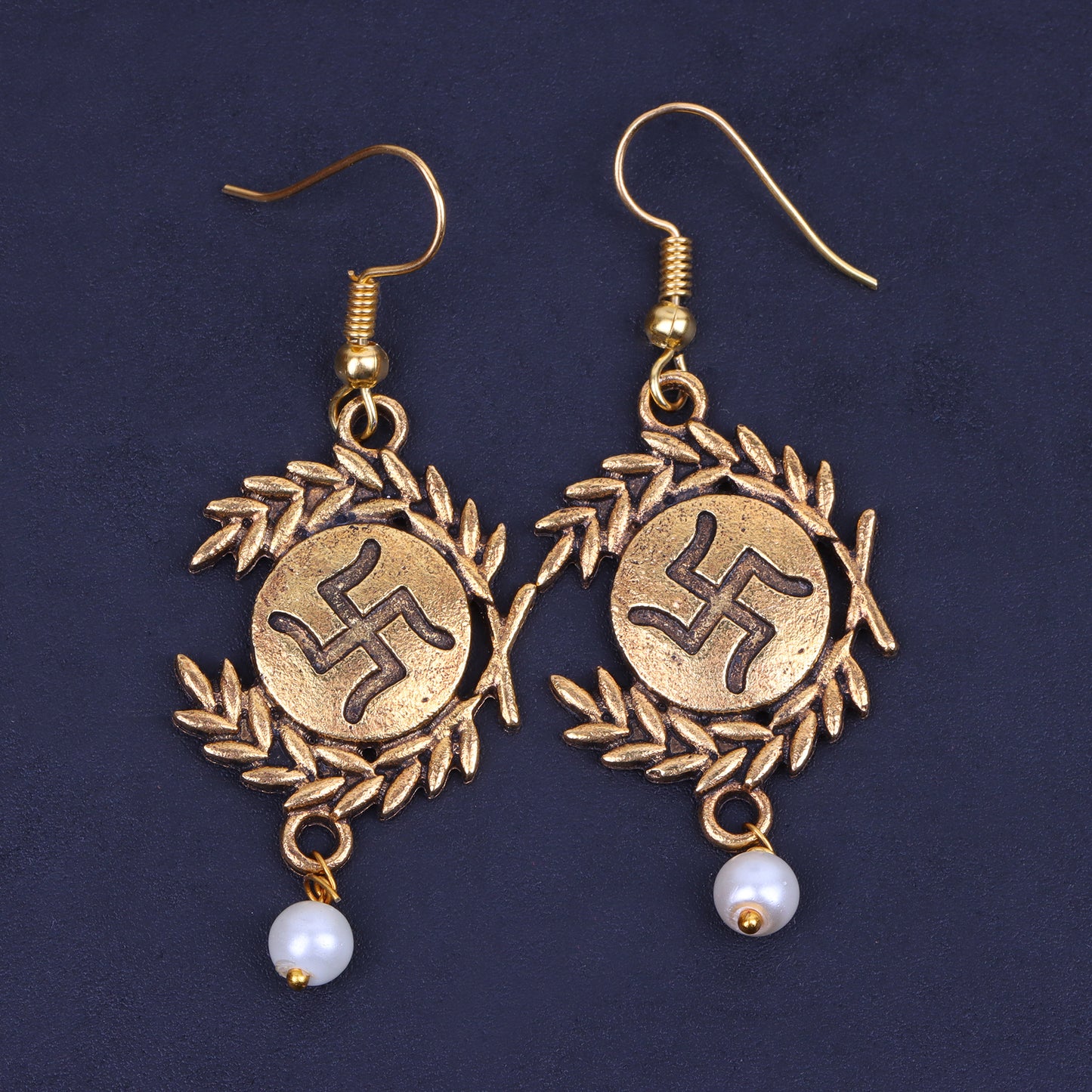 Pious Swastik dangler earrings