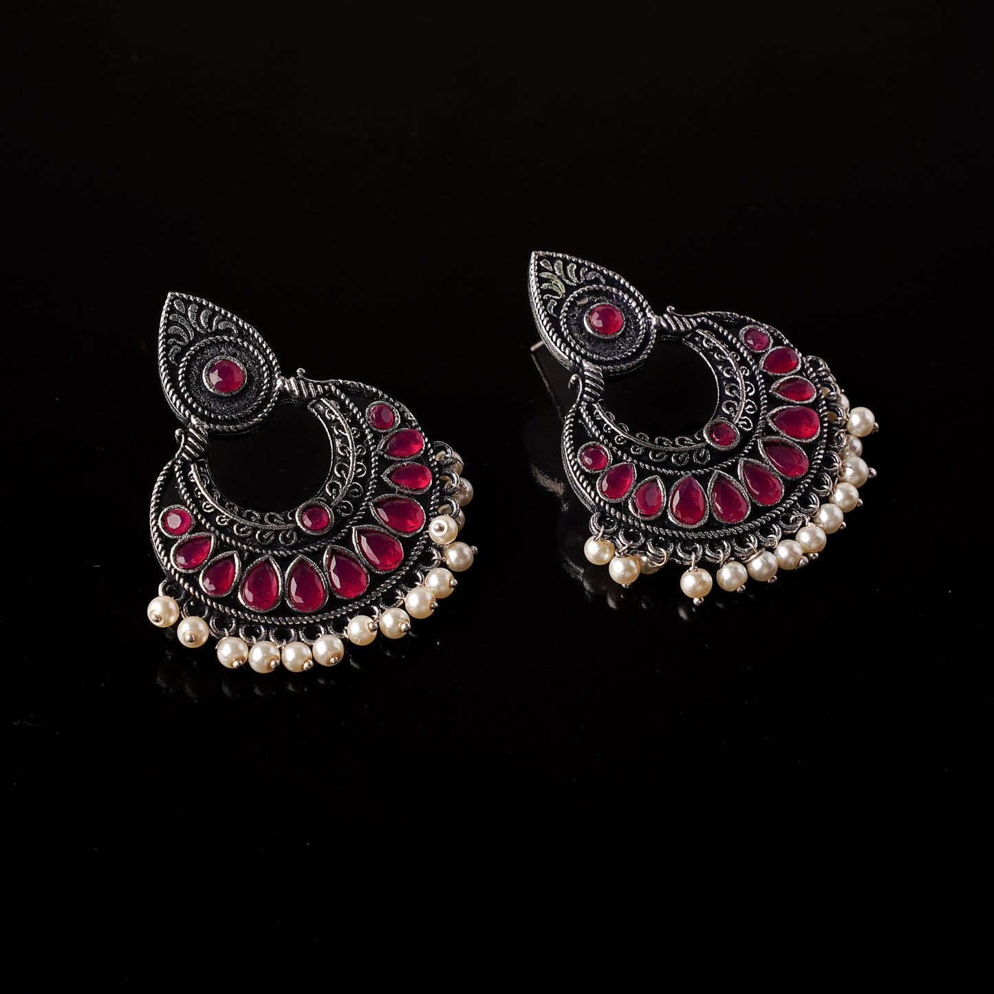 Red Stone Studded Oxidised Earrings With Hanging Pearls