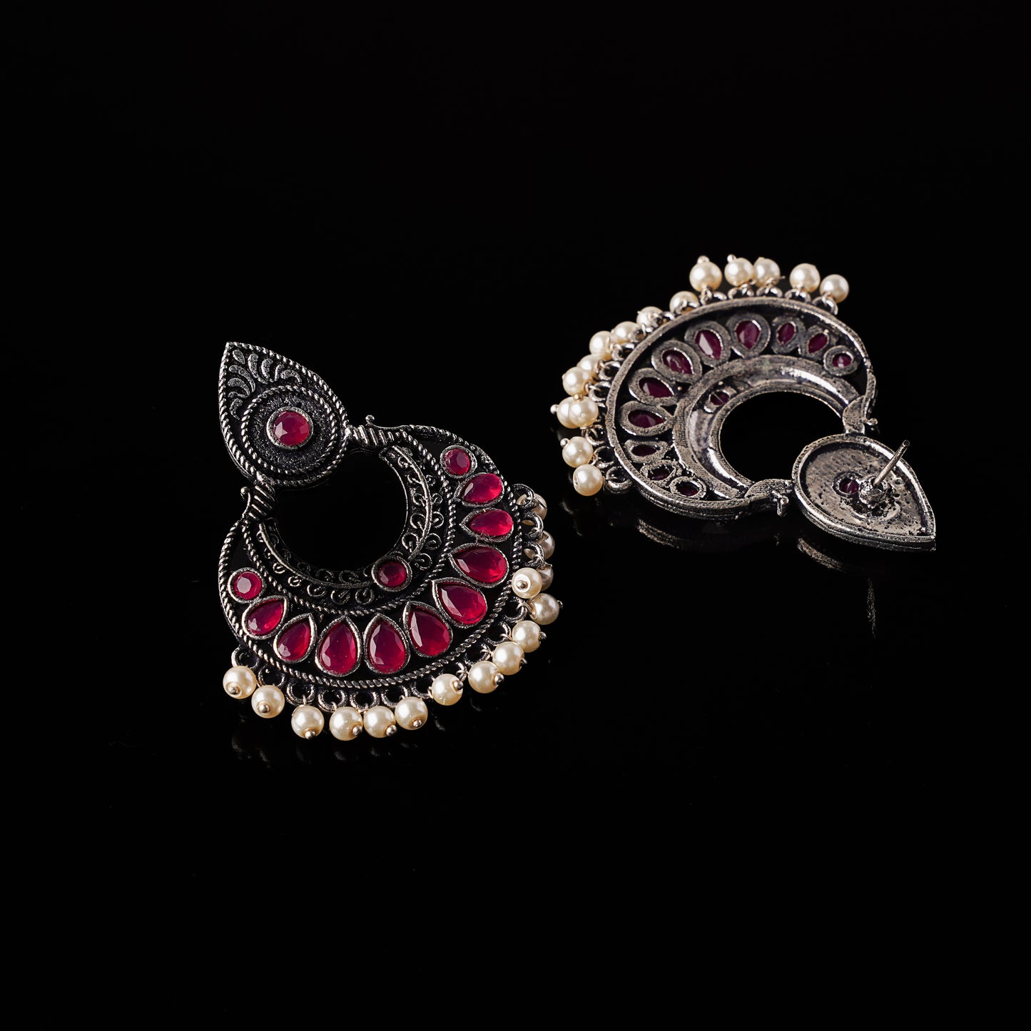Red Stone Studded Oxidised Earrings With Hanging Pearls