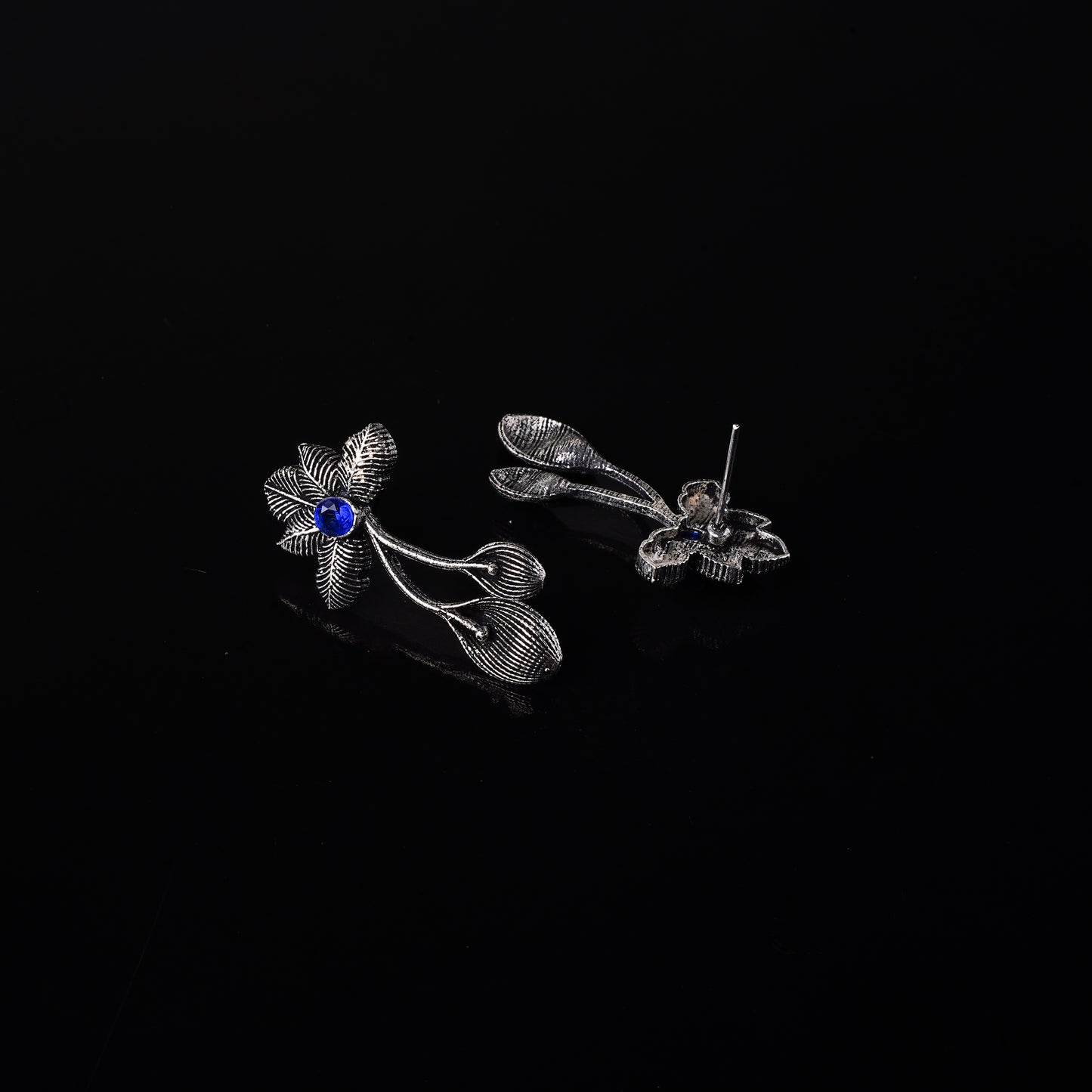 Blue Stone Studded Flower Shaped Intricate Oxidised Earrings