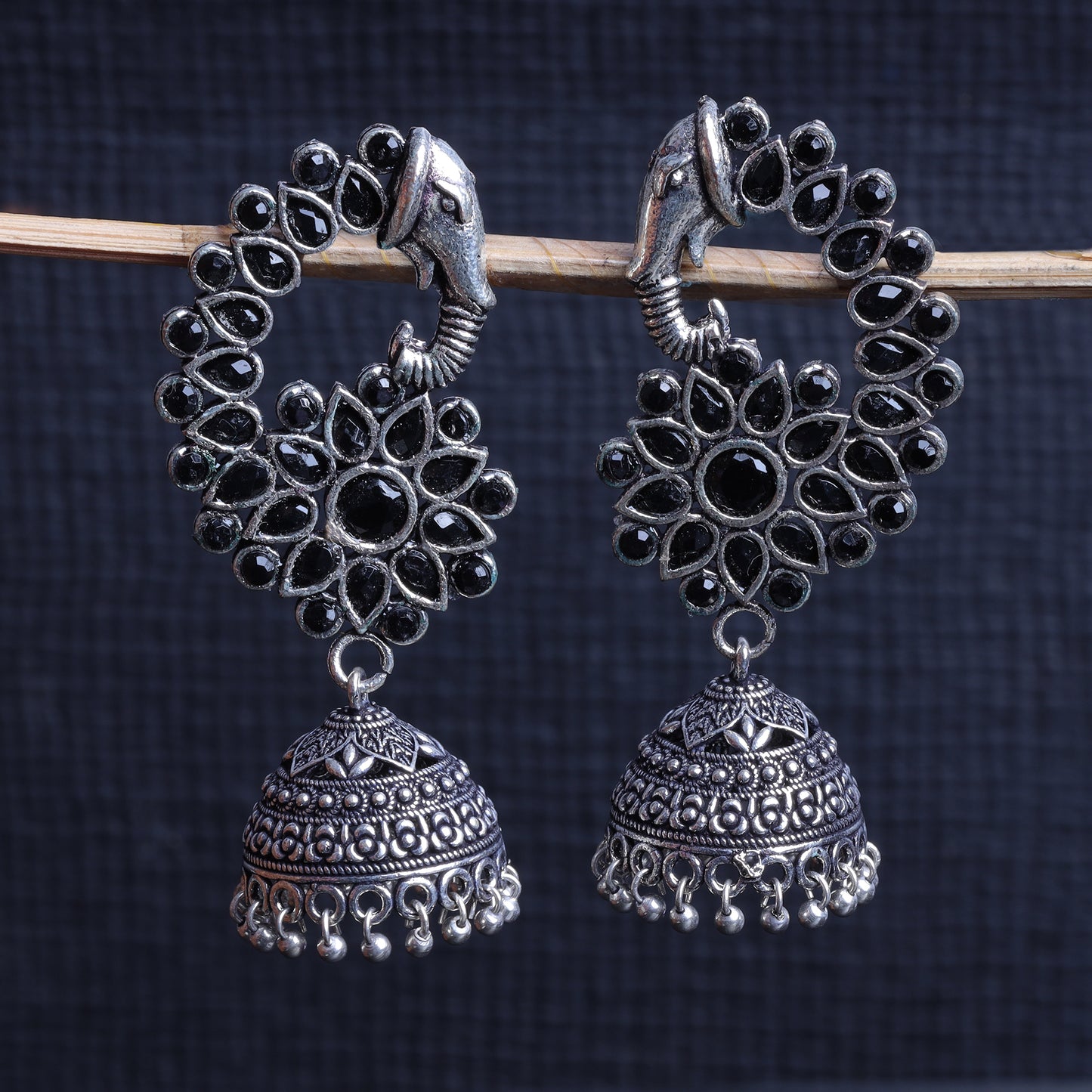 Tusks and twinkle stone studded jhumka earrings (Black)