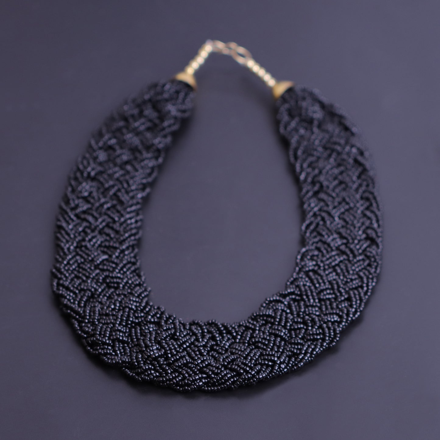 Blazing black braided beaded neckpiece