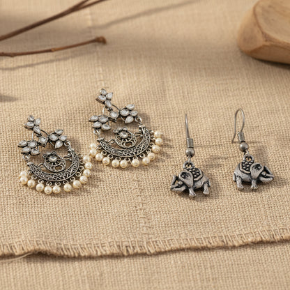 Carved Charm Dangler earrings &  Trunk Tales dangler earrings Combo set