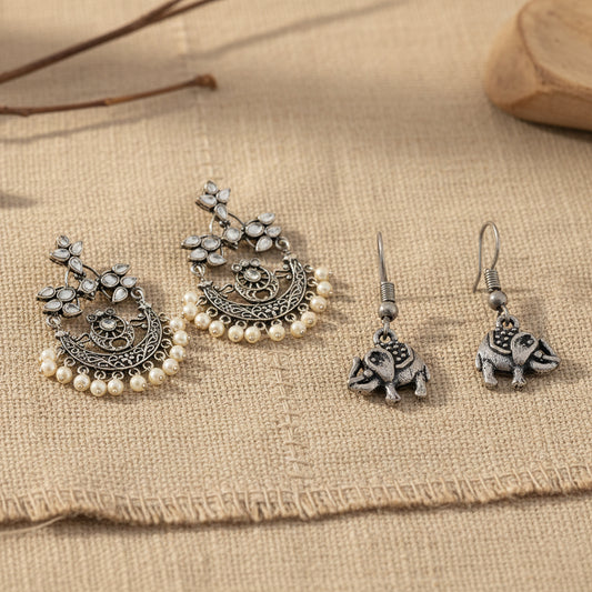 Carved Charm Dangler earrings &  Trunk Tales dangler earrings Combo set