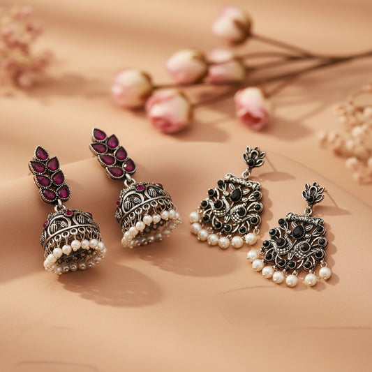 Leaf Cascade jhumki earrings (Red) Peacock glow stone studded dangler earrings (Black) Combo set