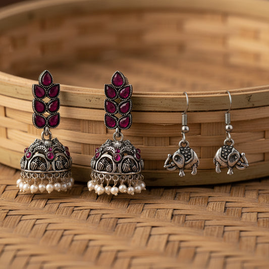Leaf Cascade jhumki earrings (Red) Trunk Tales dangler earrings (Silver) Combo set