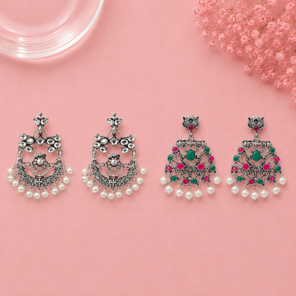 Carved Charm Dangler earrings (White) Peacock glow stone studded dangler earrings (Multicolored) Combo set