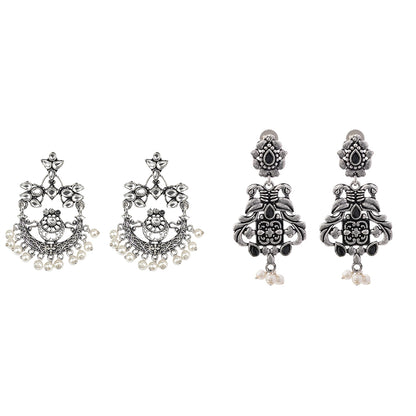 Carved Charm Dangler earrings (White) Feathered Grace dangler earrings (Black) Combo set