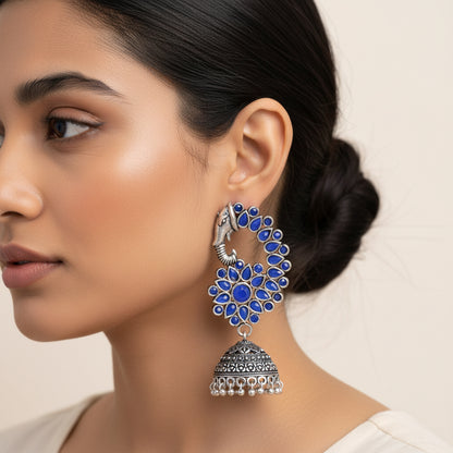 Tusks and twinkle stone studded jhumka earrings (Blue)