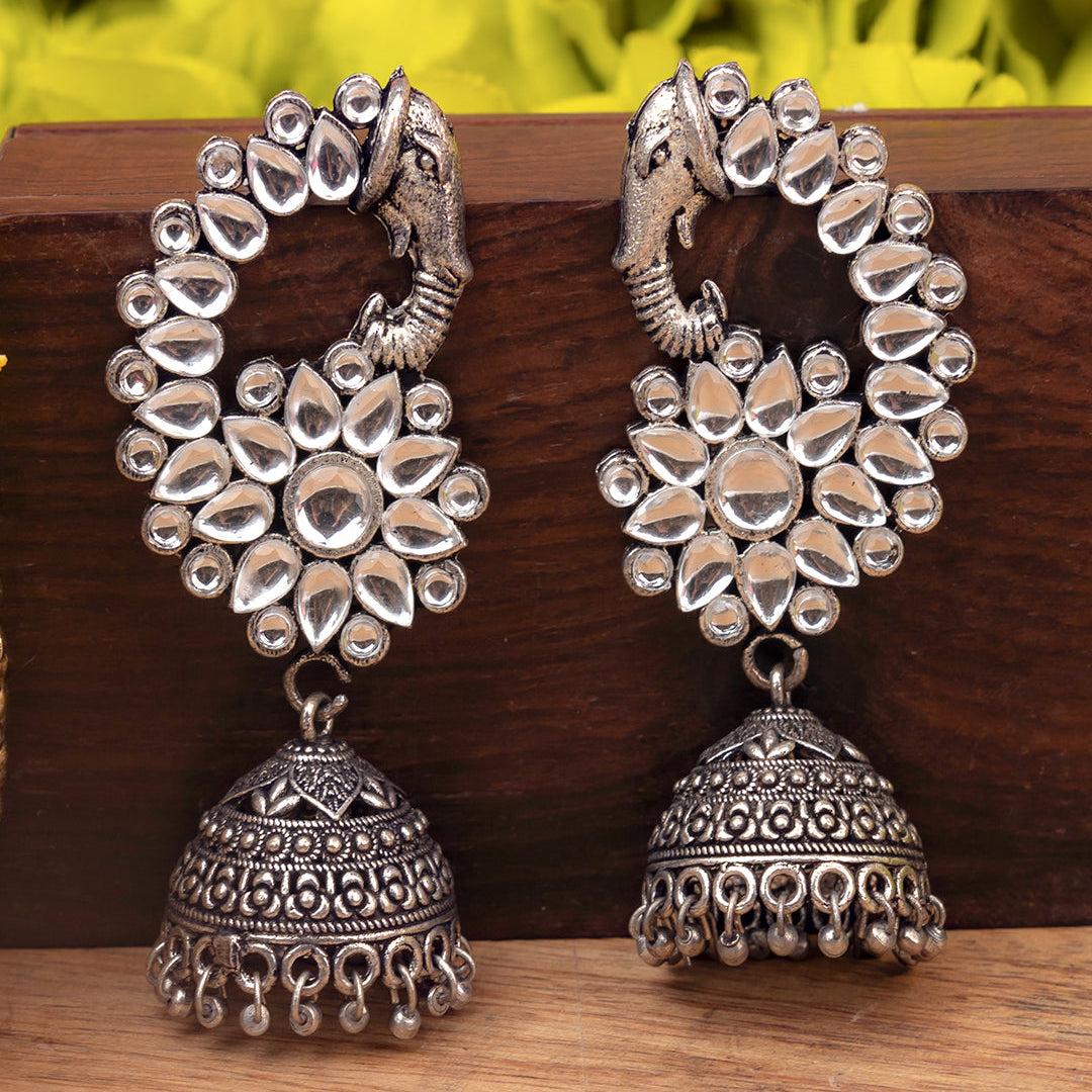 Tusks and twinkle stone studded jhumka earrings (White)