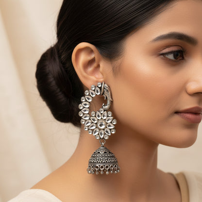 Tusks and twinkle stone studded jhumka earrings (White)