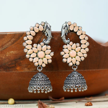 Tusks and twinkle stone studded jhumka earrings (Light Orange)