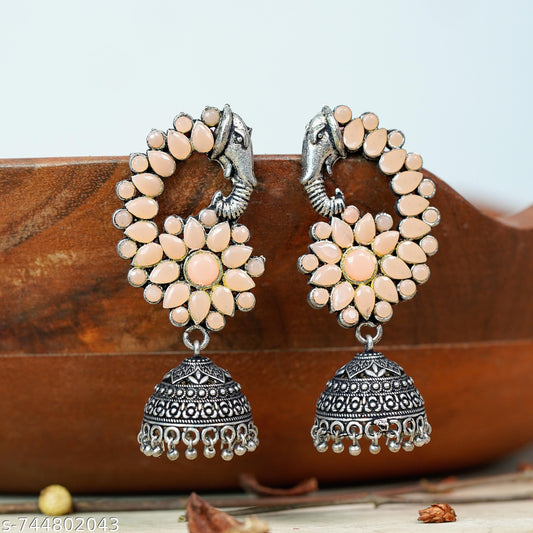 Tusks and twinkle stone studded jhumka earrings (Light Orange)