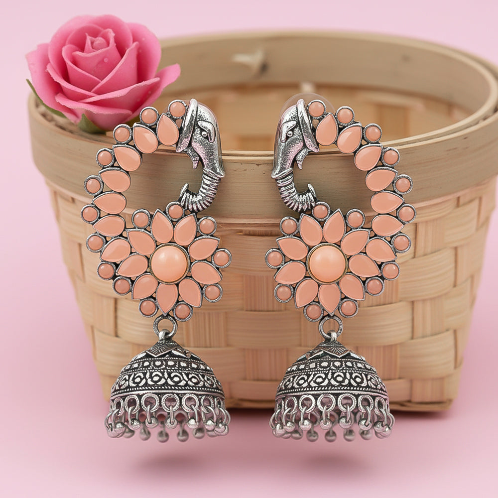 Tusks and twinkle stone studded jhumka earrings (Light Orange)